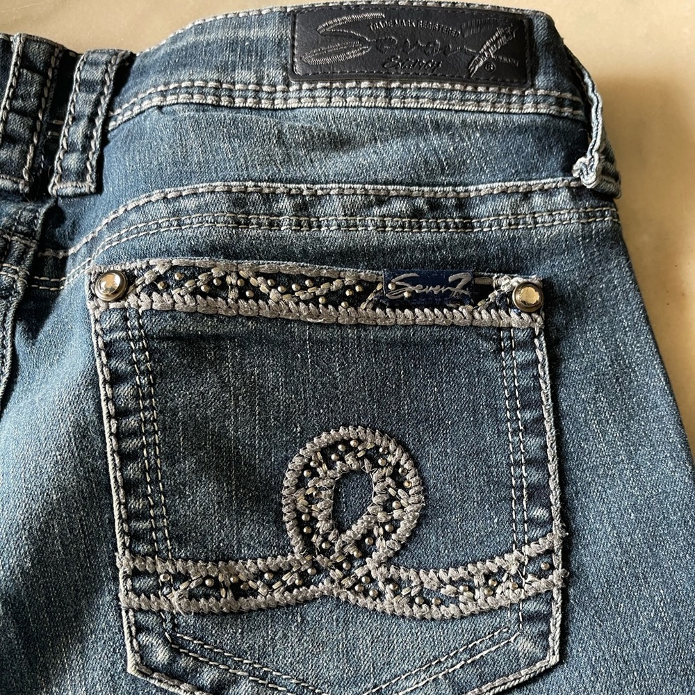 Embellished blue jeans